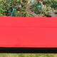 Vintage sofa 3 places convertible, red fabric and black skaï.1960s.