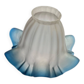 Antique tulip lampshade in transparent glass with a blue rim.