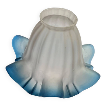 Antique tulip lampshade in transparent glass with a blue rim.