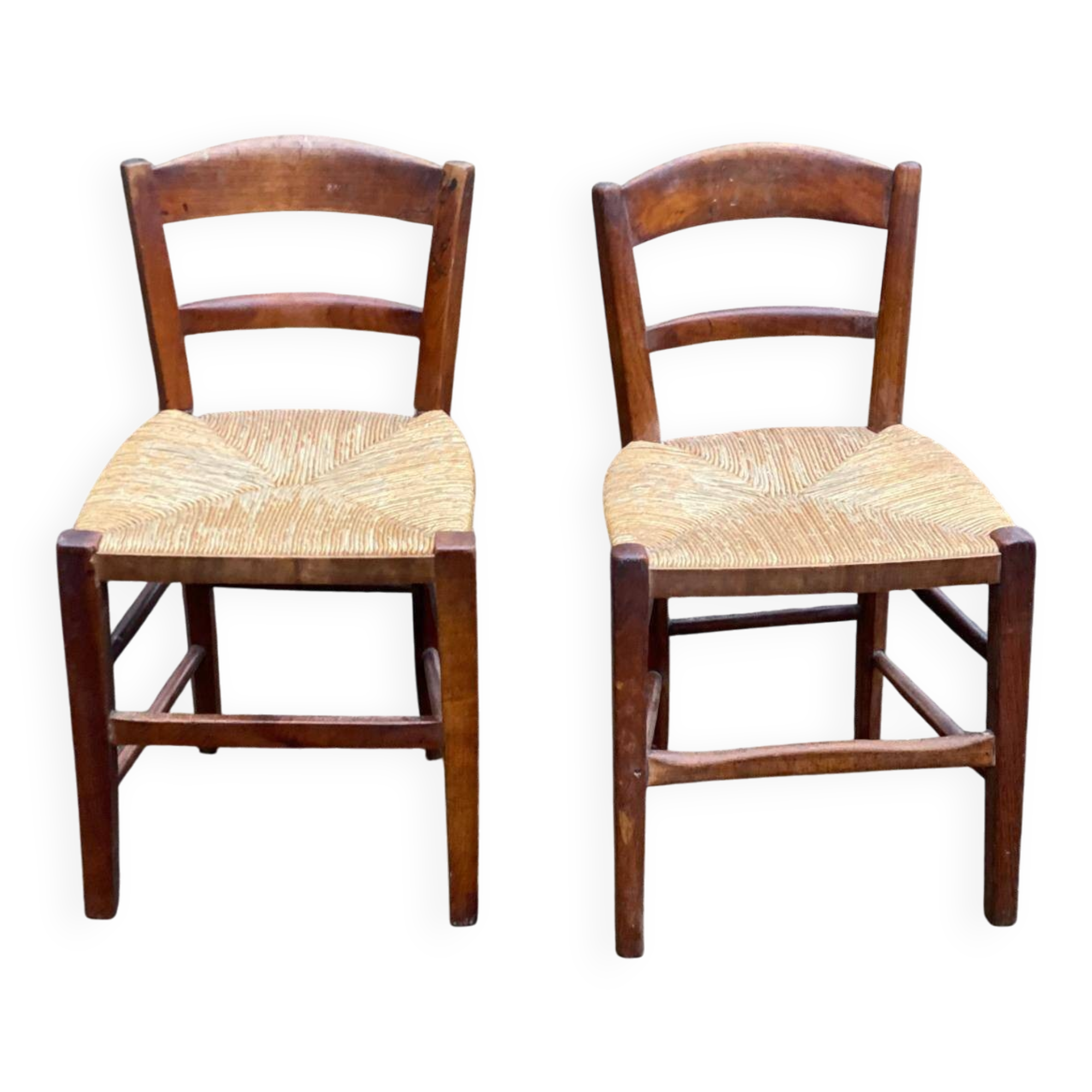 2 solid wood chairs with rush seats, child size.