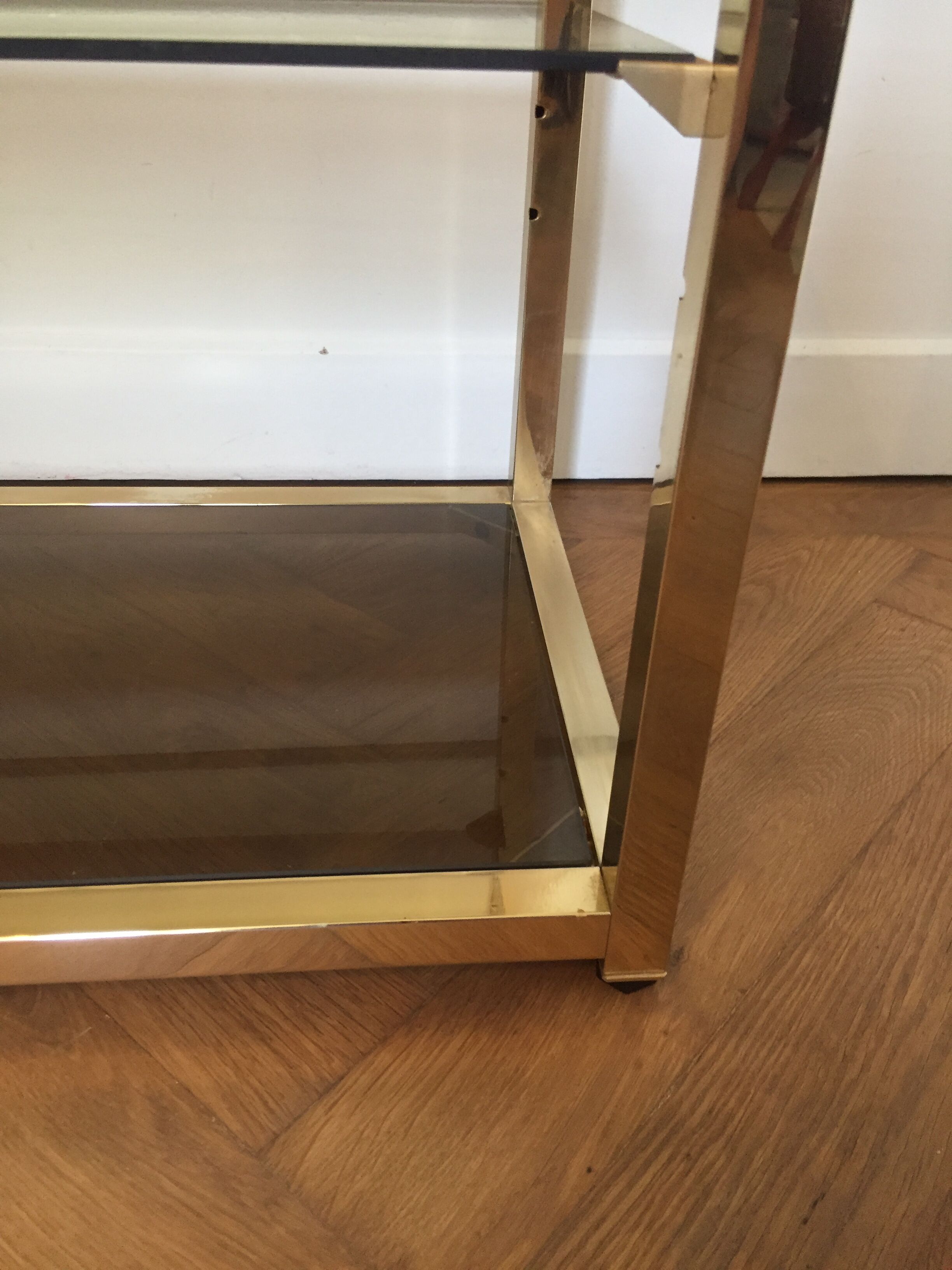 Pair of consoles brass shelves and smoked glass design Roche Bobois