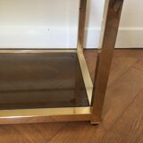 Pair of consoles brass shelves and smoked glass design Roche Bobois