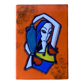 Vintage glazed ceramic wall plaque - water carrier pattern