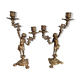 Pair of antique candlesticks in cherub bronze