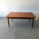 Rectangular extendable dining table with Scandinavian design in teak.