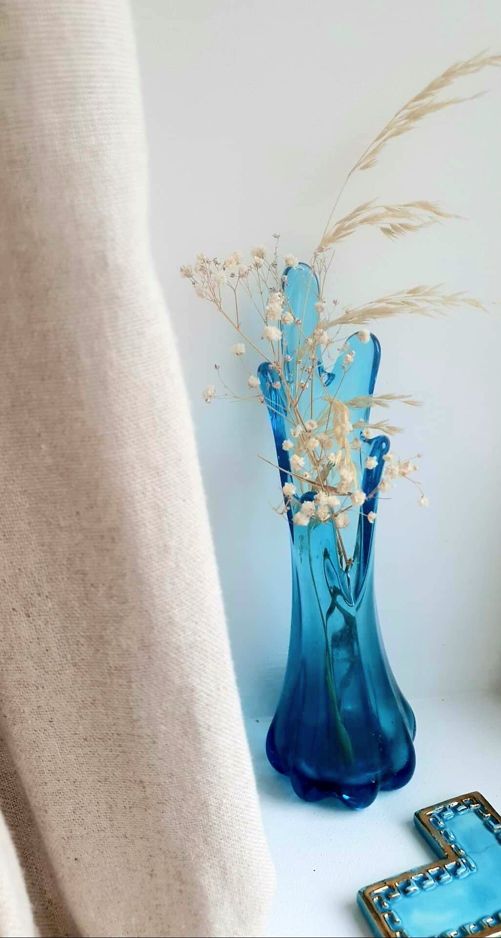 Corolla vase in blue glass