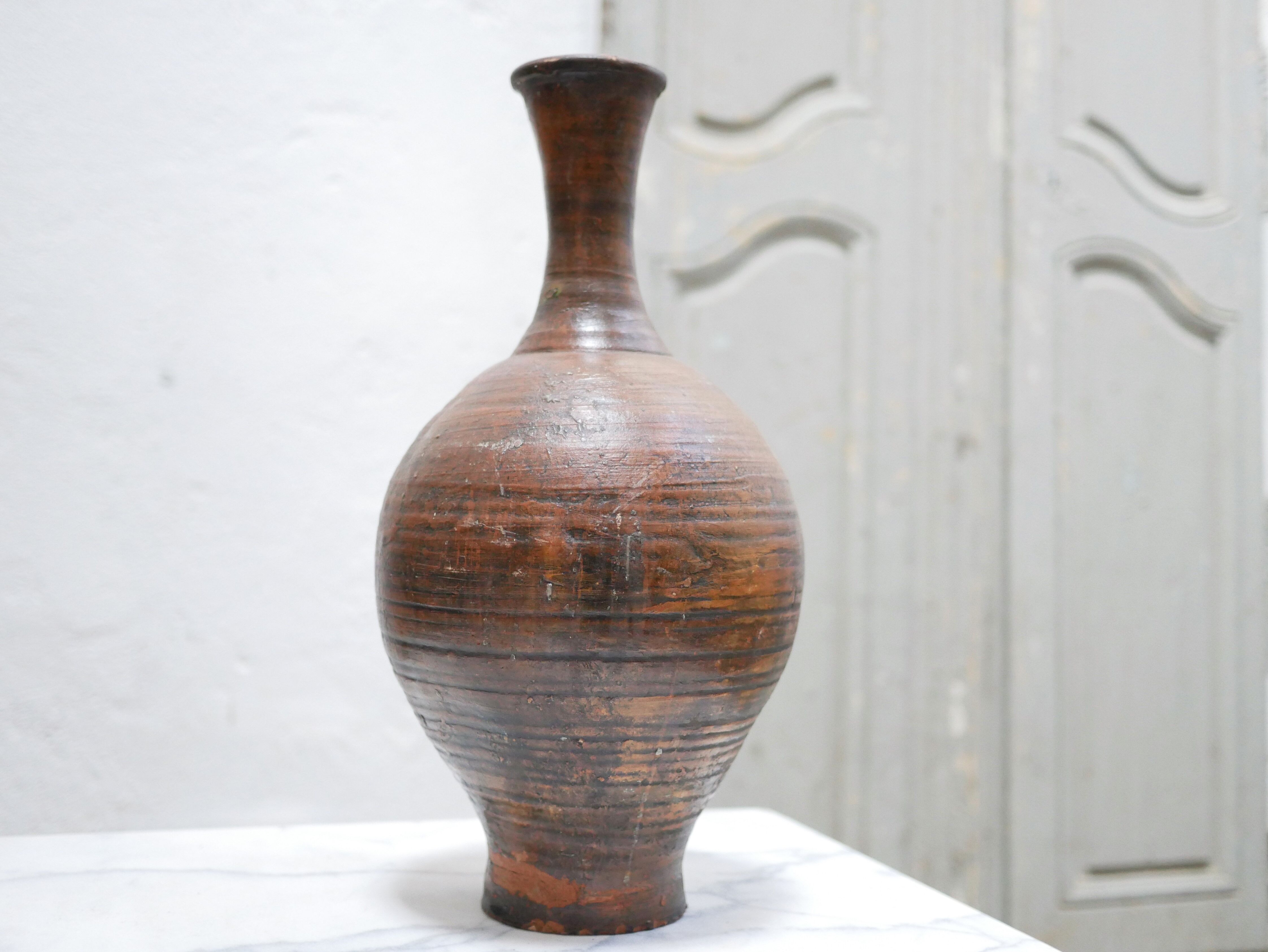 Vintage glazed terracotta jar