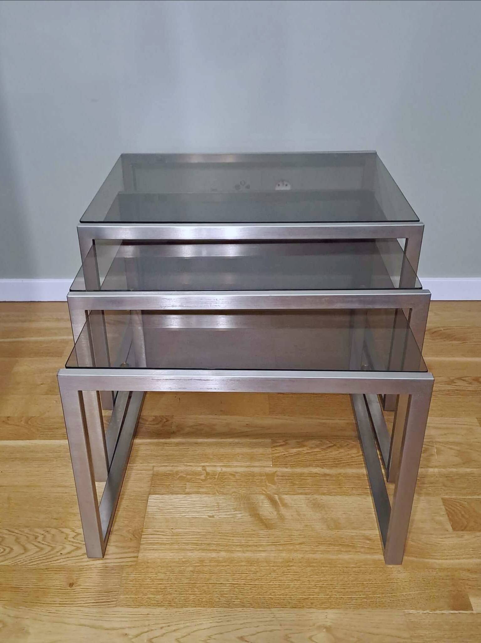 Chrome and smoked glass designer nesting table
