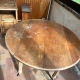 Round drop-leaf table