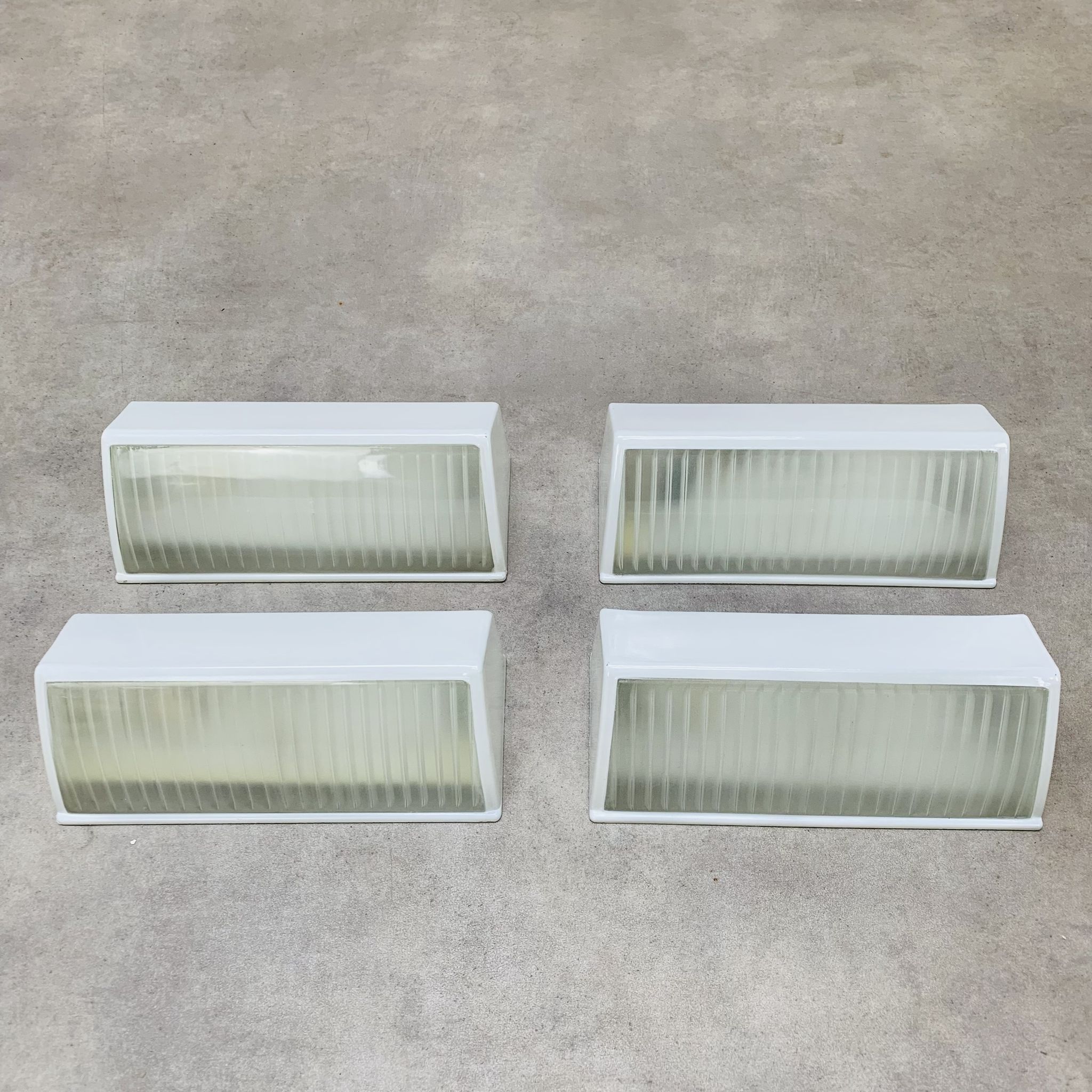 Pair of Holophane Prismopal wall lights, 1950s design.