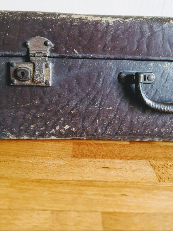 Chocolate vintage cardboard suitcase