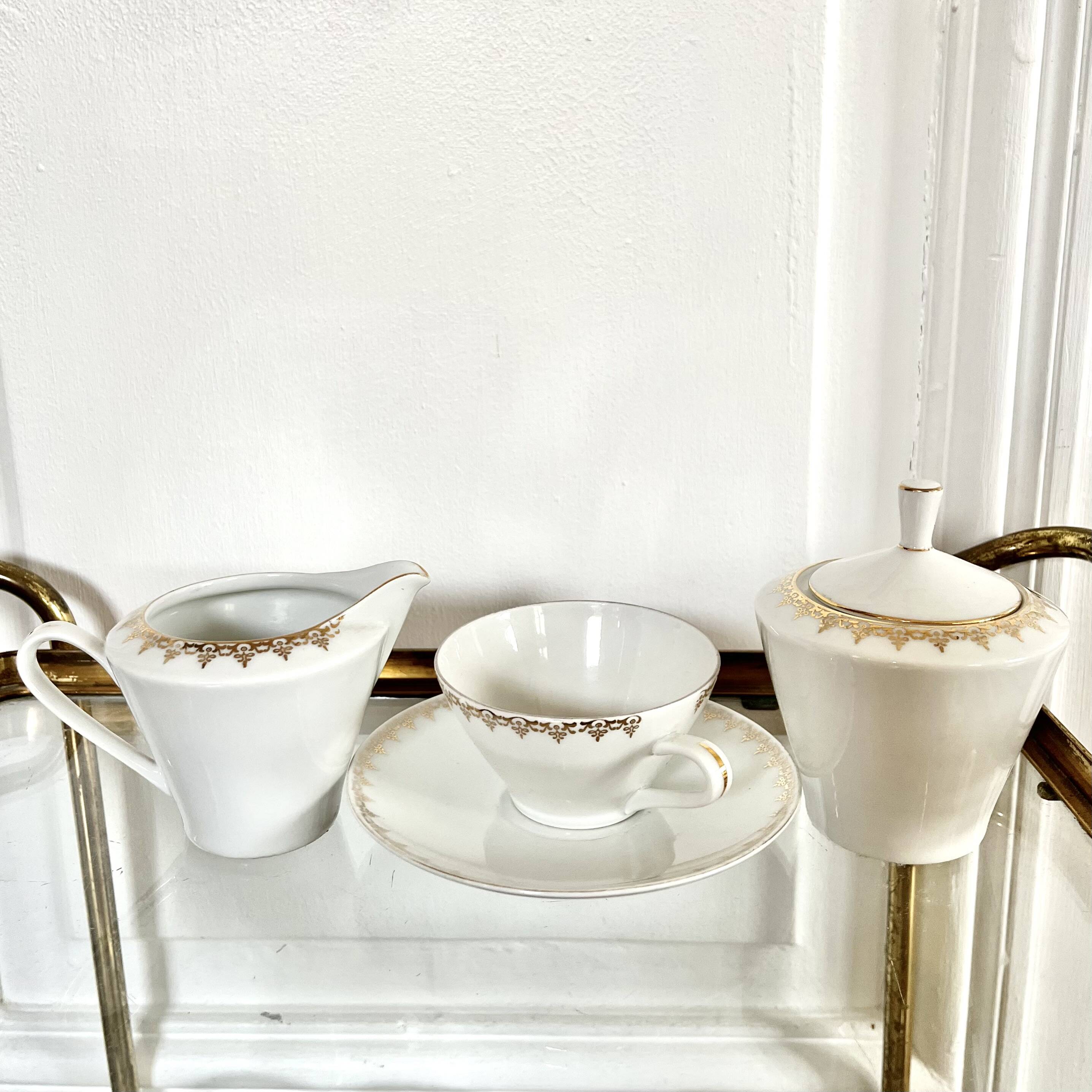 Porcelain sugar bowl and milk jug