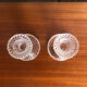 Old pair of vintage round molded glass candle holder