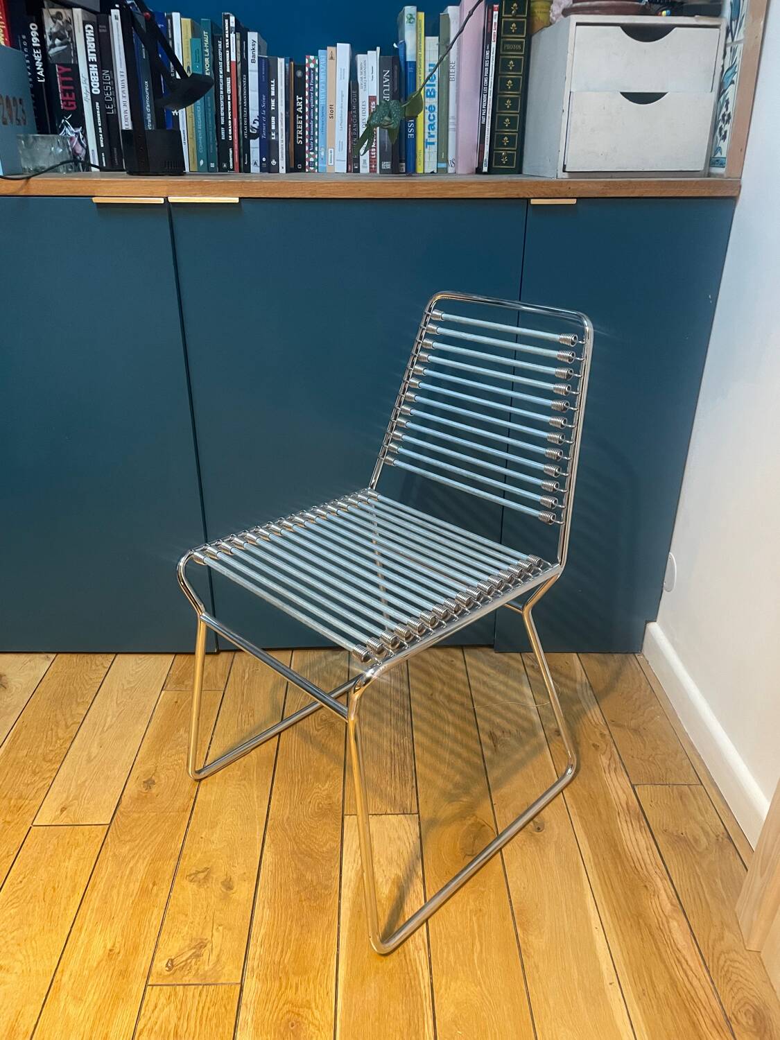 2 metal chairs with bungee cords
