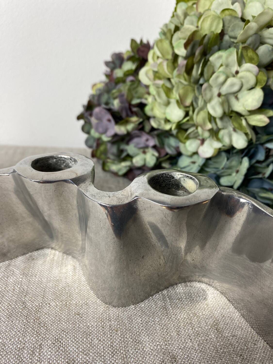 Brushed aluminum candle holder