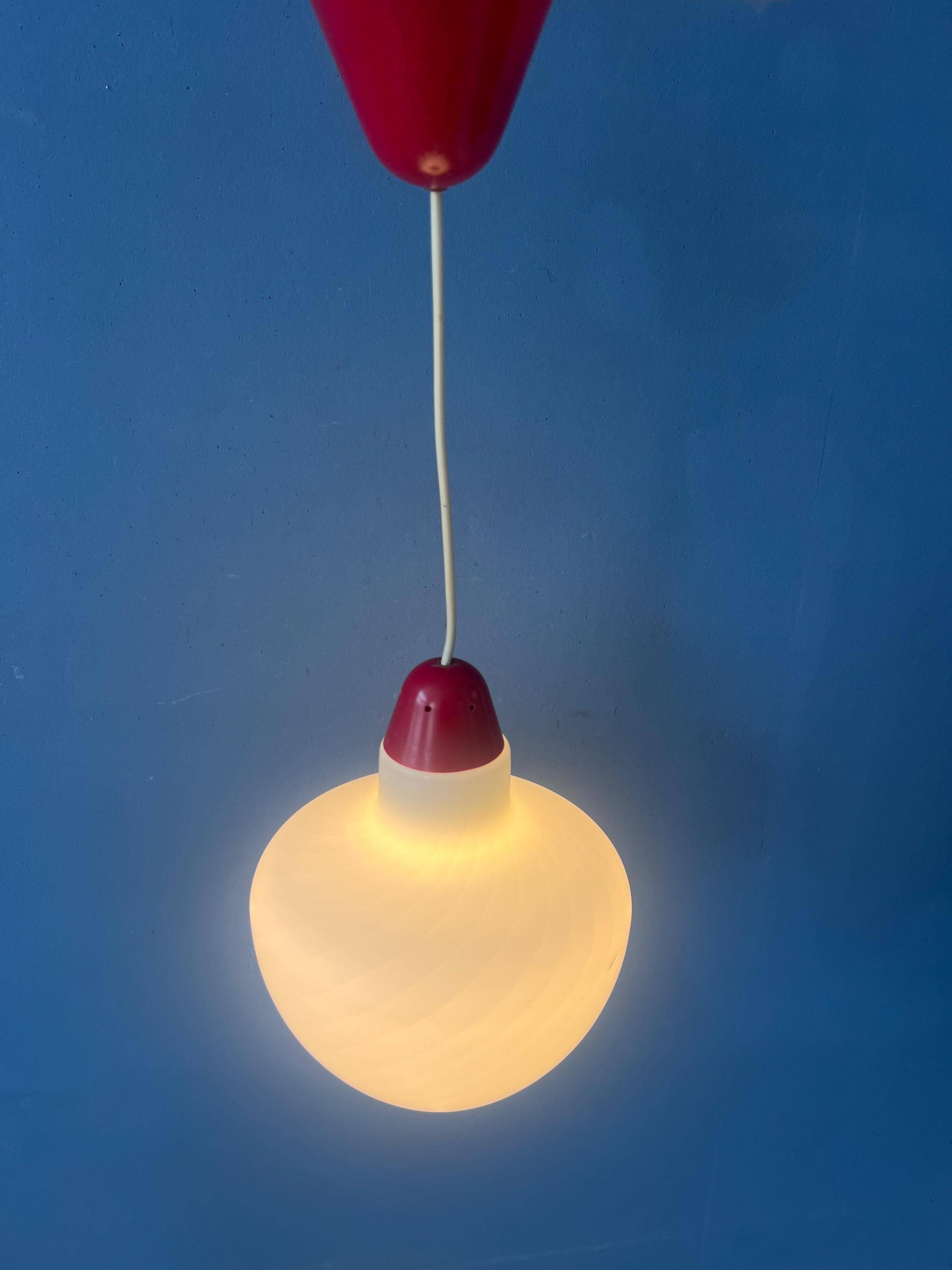 Mid-Century opaline glass suspension with a red upper part and ceiling cover.