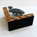 Art Deco bird bookend on marble