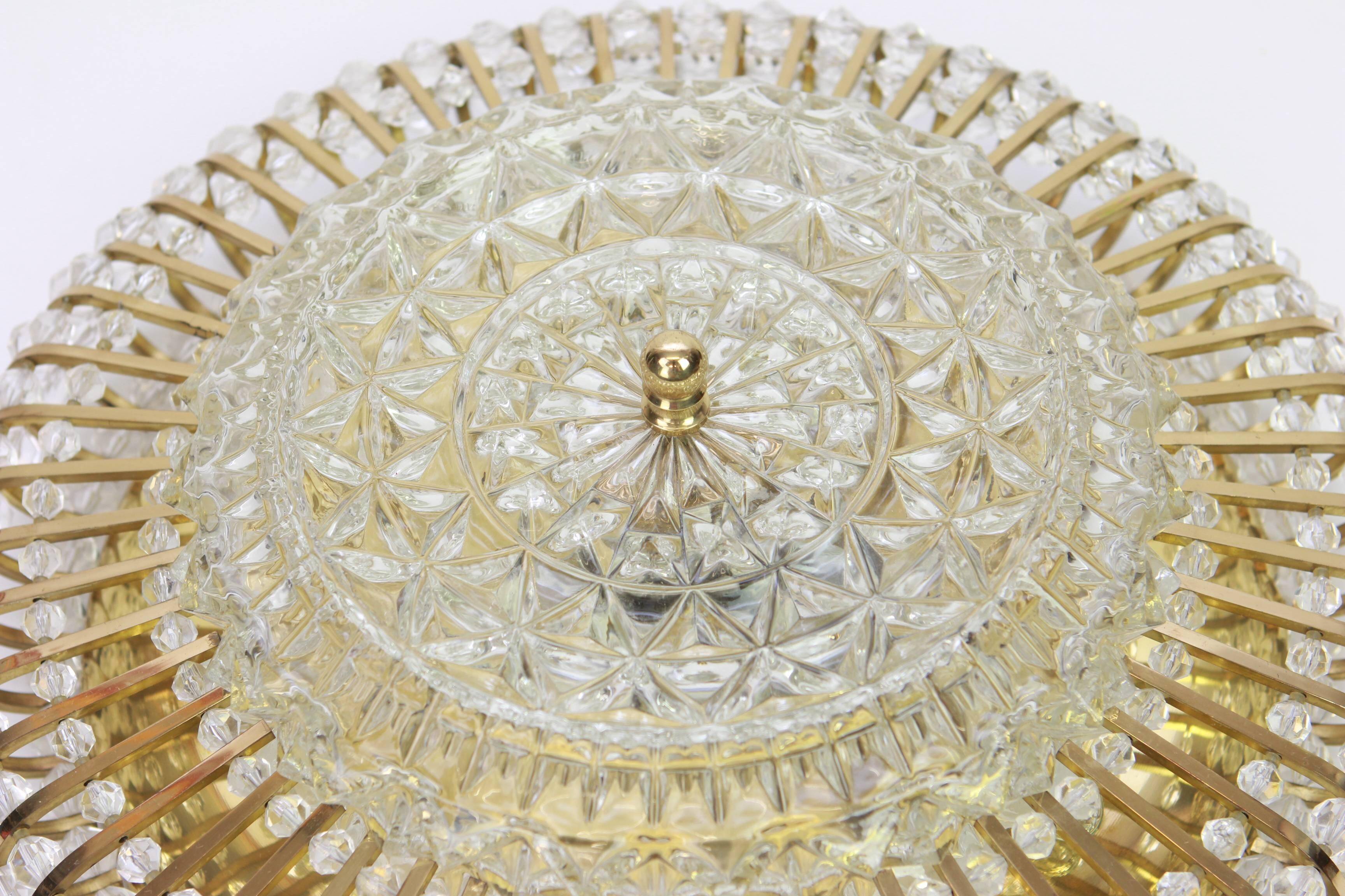 Hillebrand wall sconce in brass, glass, and Lucite beads, Germany, 1960s.