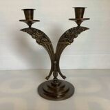 Candle holders in the shape of art deco butterfly wings