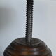 Antique piano stool with adjustable screws and turned wooden legs