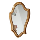 Vintage baroque mirror in gilded wood in the Louis XV style.