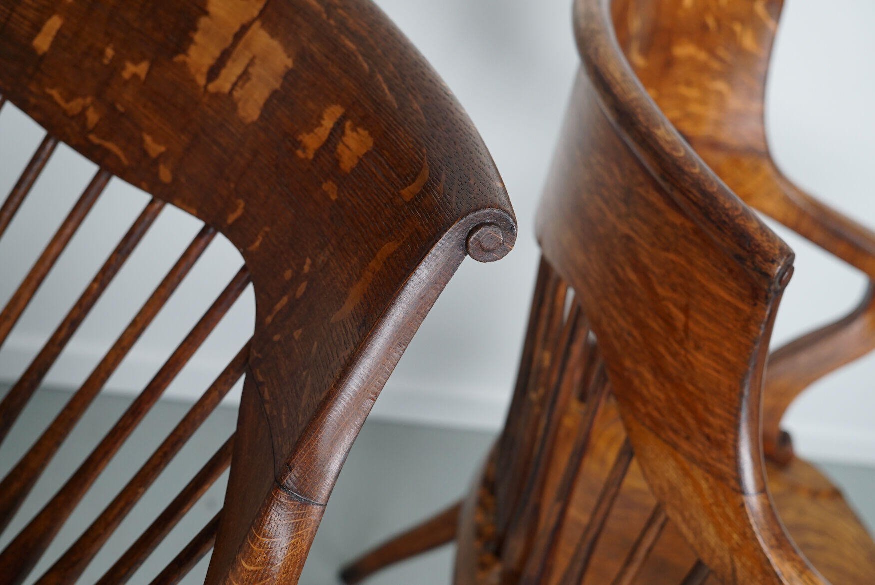 Pair of English Edwardian Oak Spindle Back Captains Office Desk Chairs