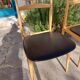 5 Scandinavian style chairs, wood and black faux leather.