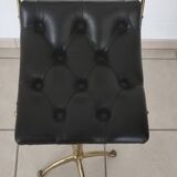 Tabouret en cuir capitonné laiton