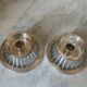 Pair of Keltum Pleet silver metal candlesticks