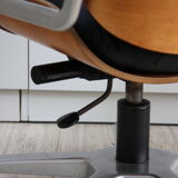 Vintage swivel office armchair in black leather and wood by Giroflex 60s