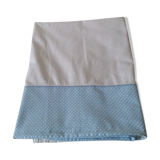 Child sheet bordering blue peas