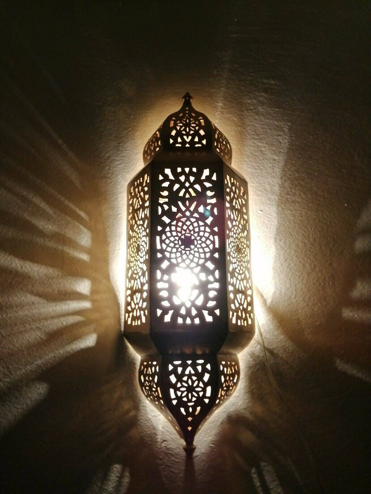 Moroccan brass wall lamp with an antique look