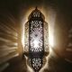 Moroccan brass wall lamp with an antique look