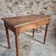 Antique French writing table in walnut with a drawer, circa 1900.