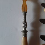 29-piece horn cutlery set, knives and serving utensils.