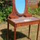Art Deco oak dressing table, marble top and swivel mirror.