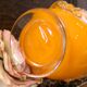 Vase orange Murano fait main avec détails floraux en verre transparent