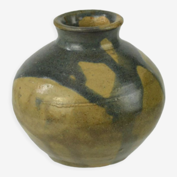 Sandstone ball vase by Eugène Lion