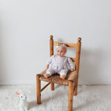 Vintage children's chair in wood and straw