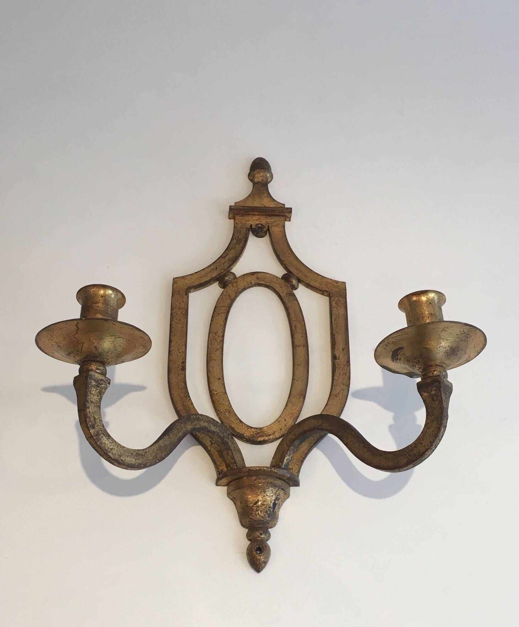 Golden Wrought Iron Wall Light with Oval Shield and Two Arms. French Work.