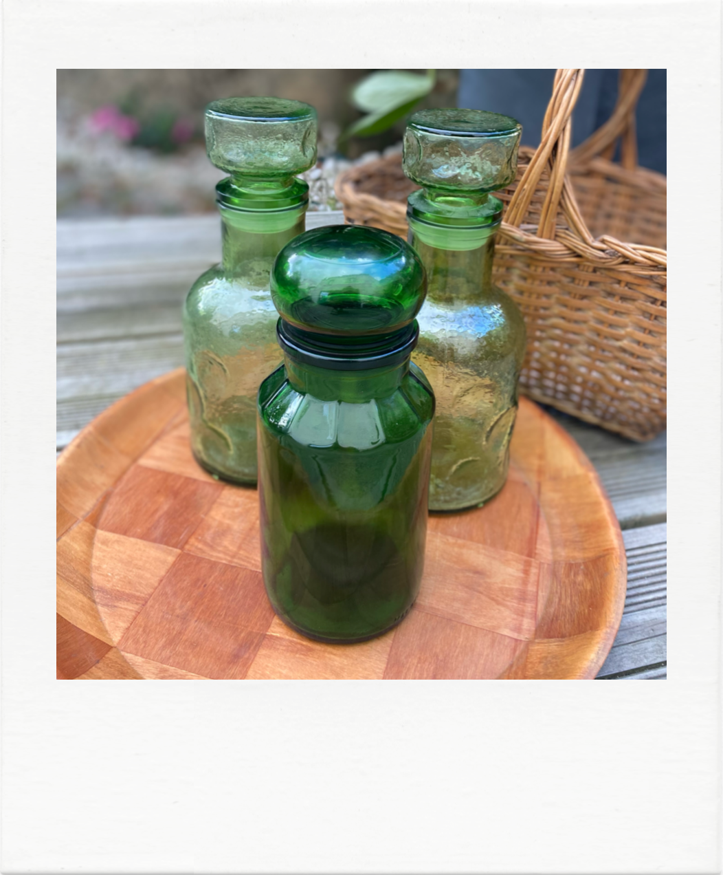 Emerald green glass bottle