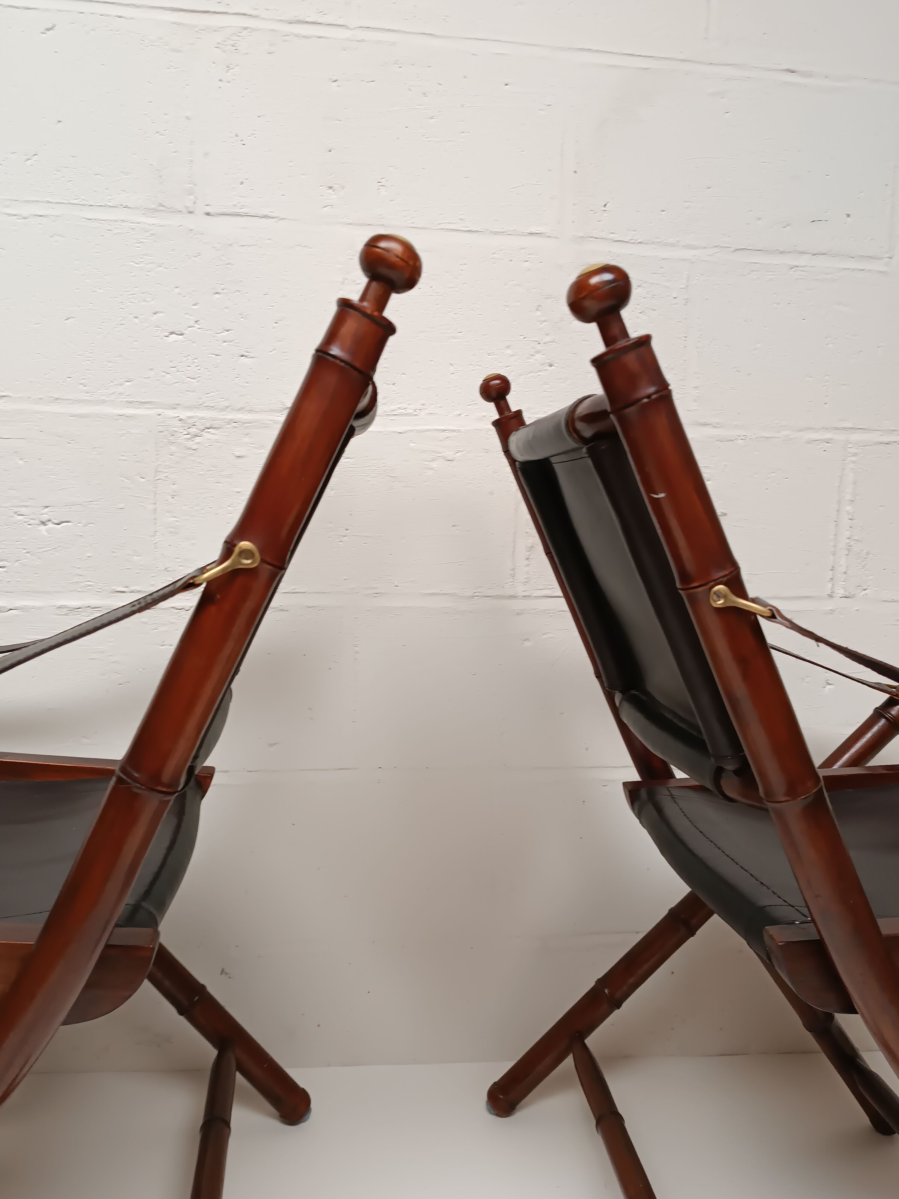 Pair of vintage "safari" folding armchairs in mahogany and leather
