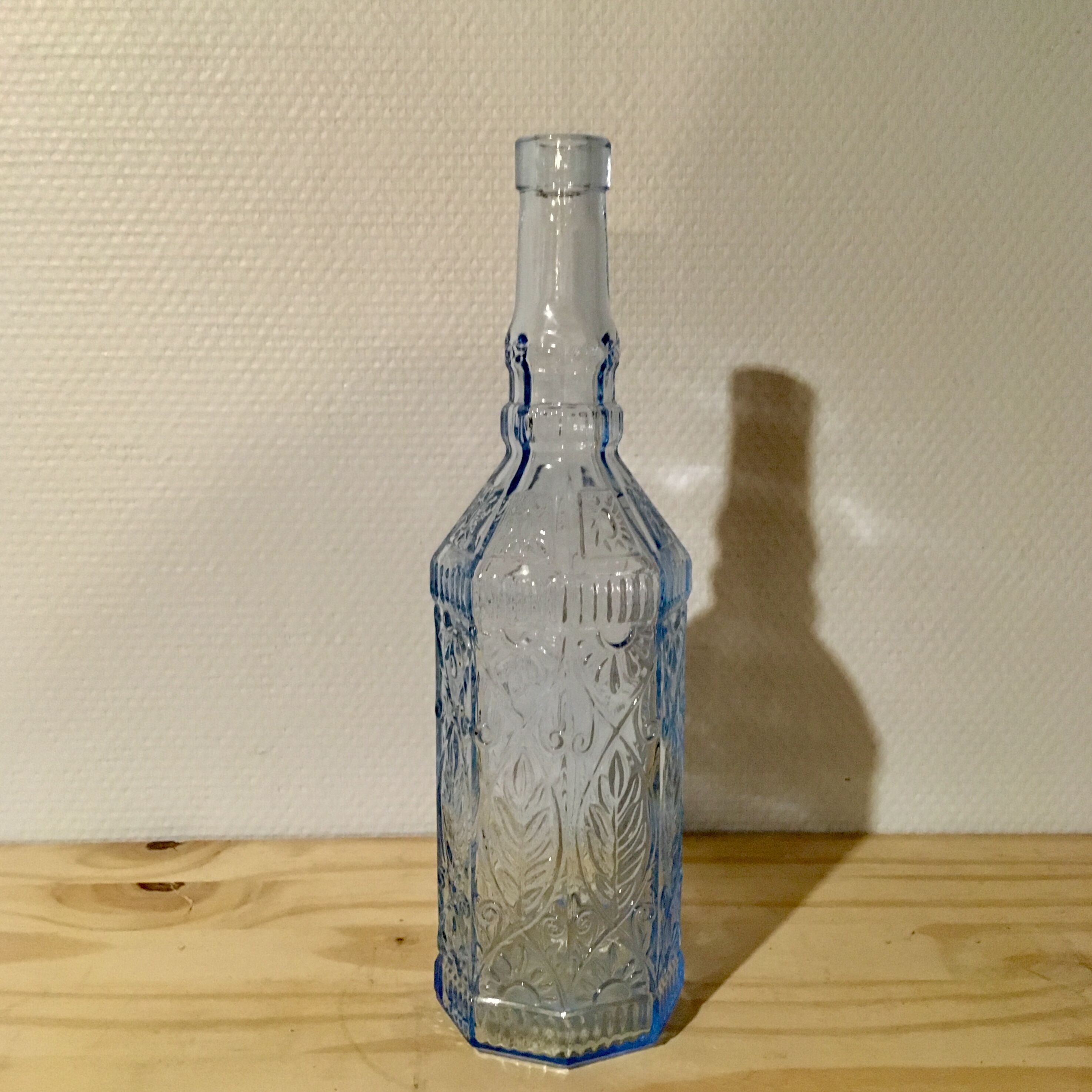 Sky blue glass bottle
