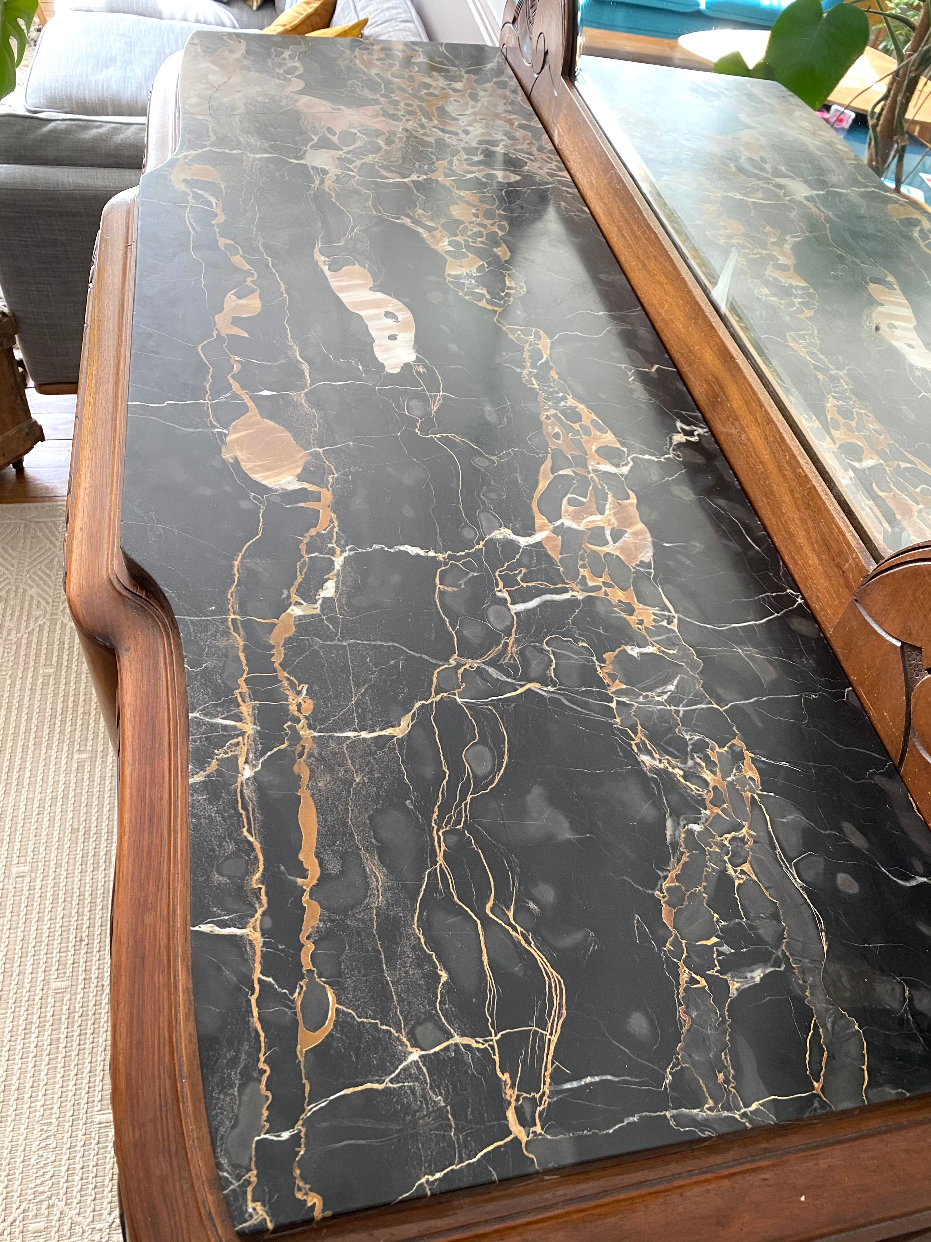 Art Deco black marble sideboard and vintage beveled mirror