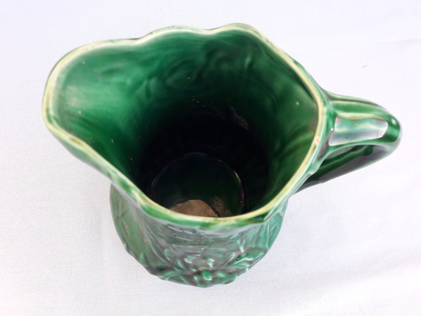 Green ceramic pitcher