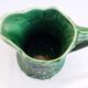 Green ceramic pitcher