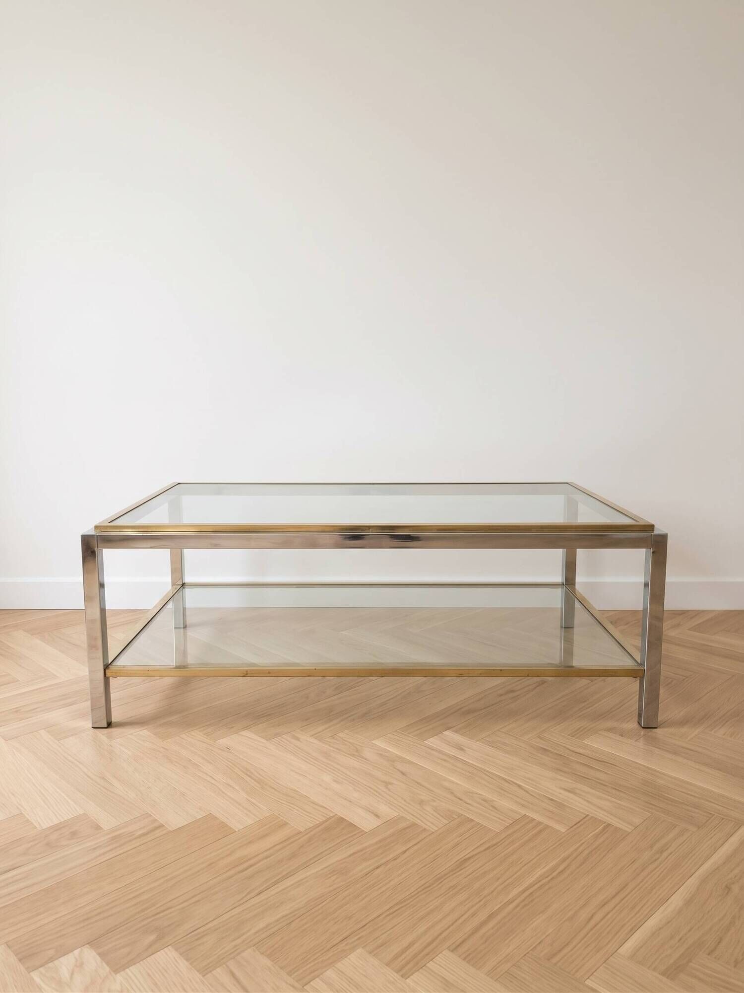 Vintage 1970s coffee table in brass and chrome in the style of Willy Rizzo.