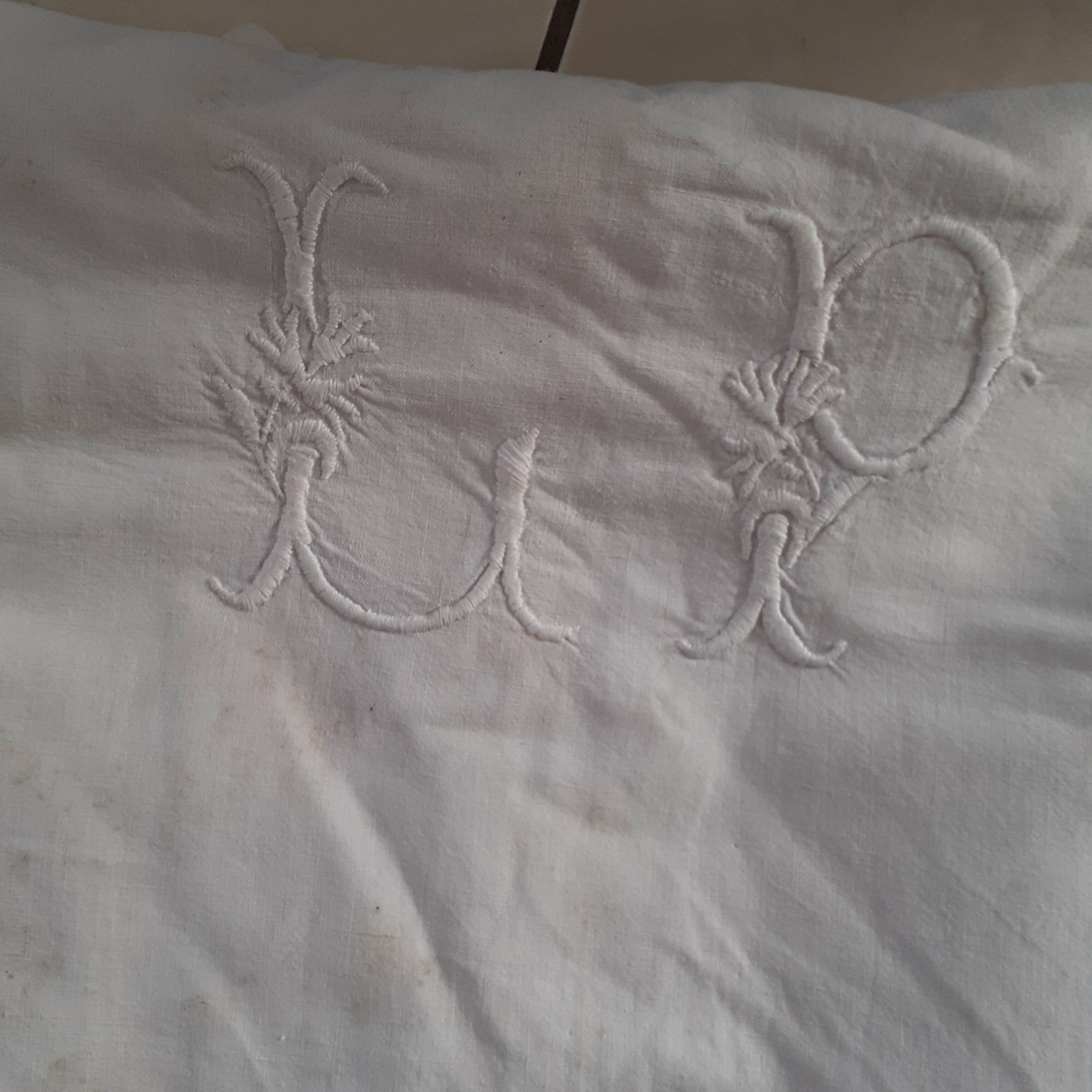 Old sheet quite thick with monogram.