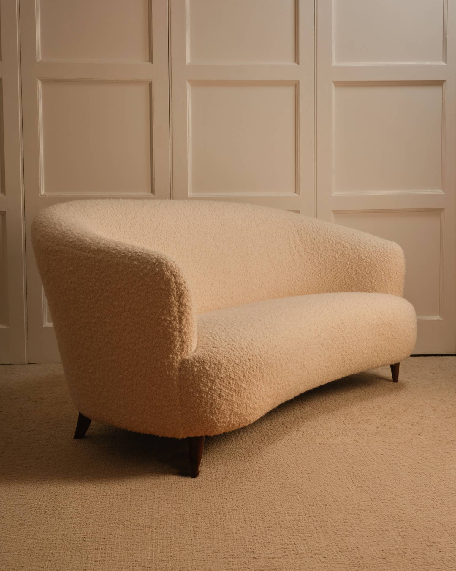 Curved sofa in the style of Maison & Jardin, 1940