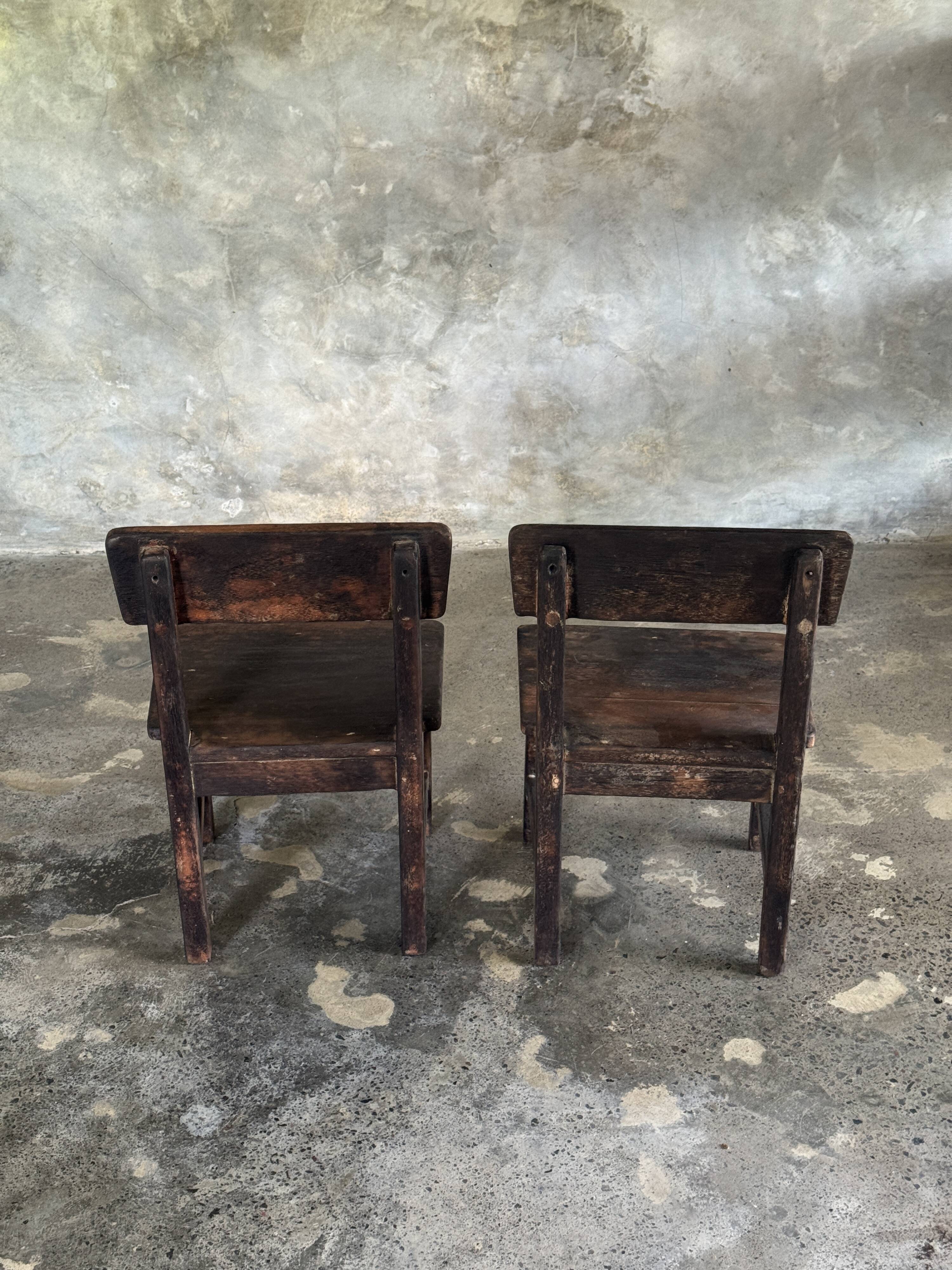 Small antique Indonesian children's chair in teak.